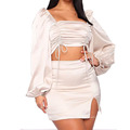 The New Trend for Fall Is a Sexy Two-Piece Midriff-Baring, Long-Sleeved Skirt Set with Ruffles and Slit